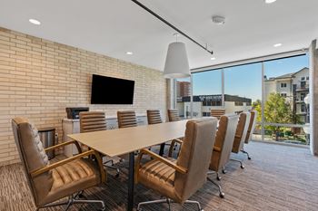 A conference room with a glass wall